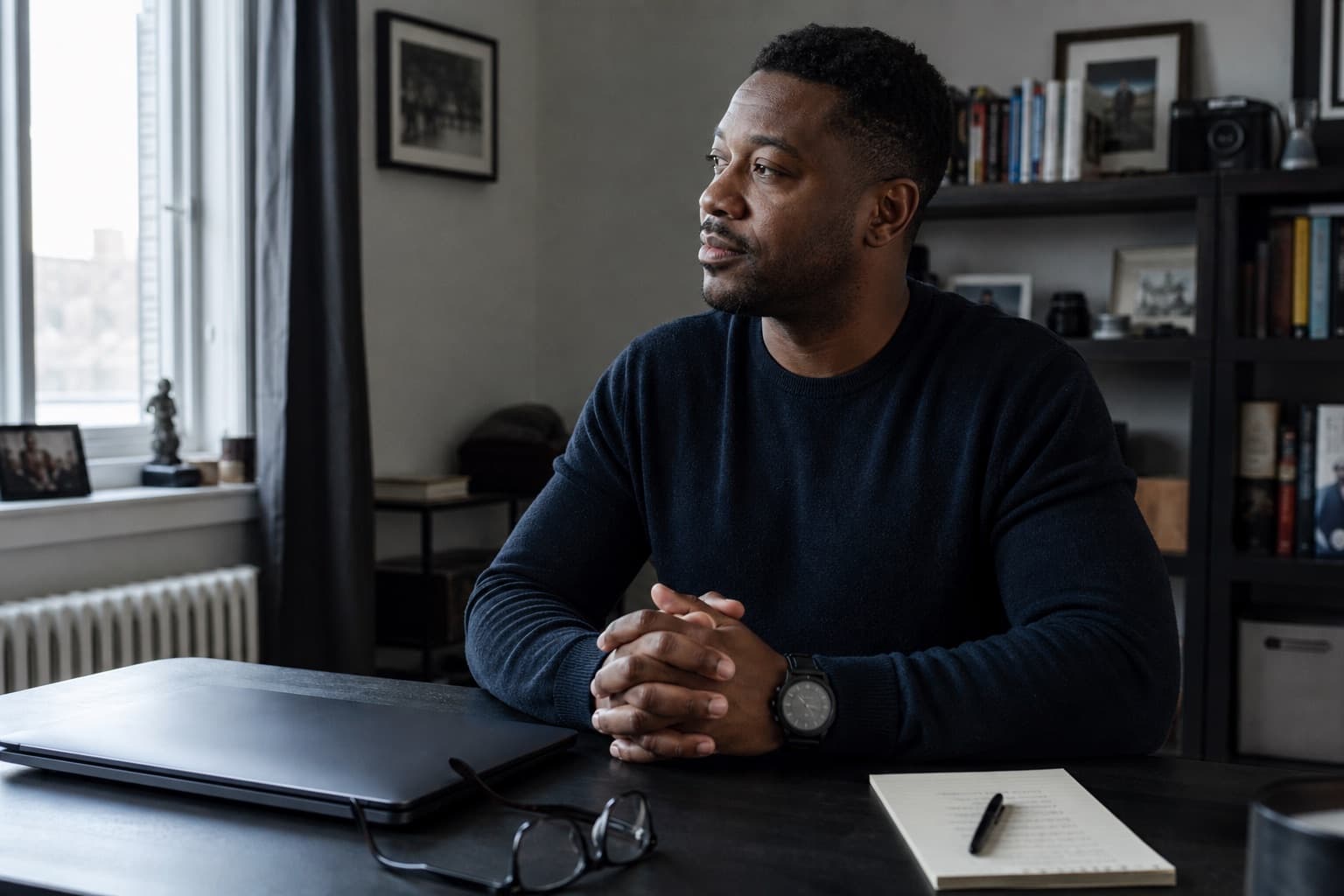 A man preparing at home for a private virtual men's-health conversation
